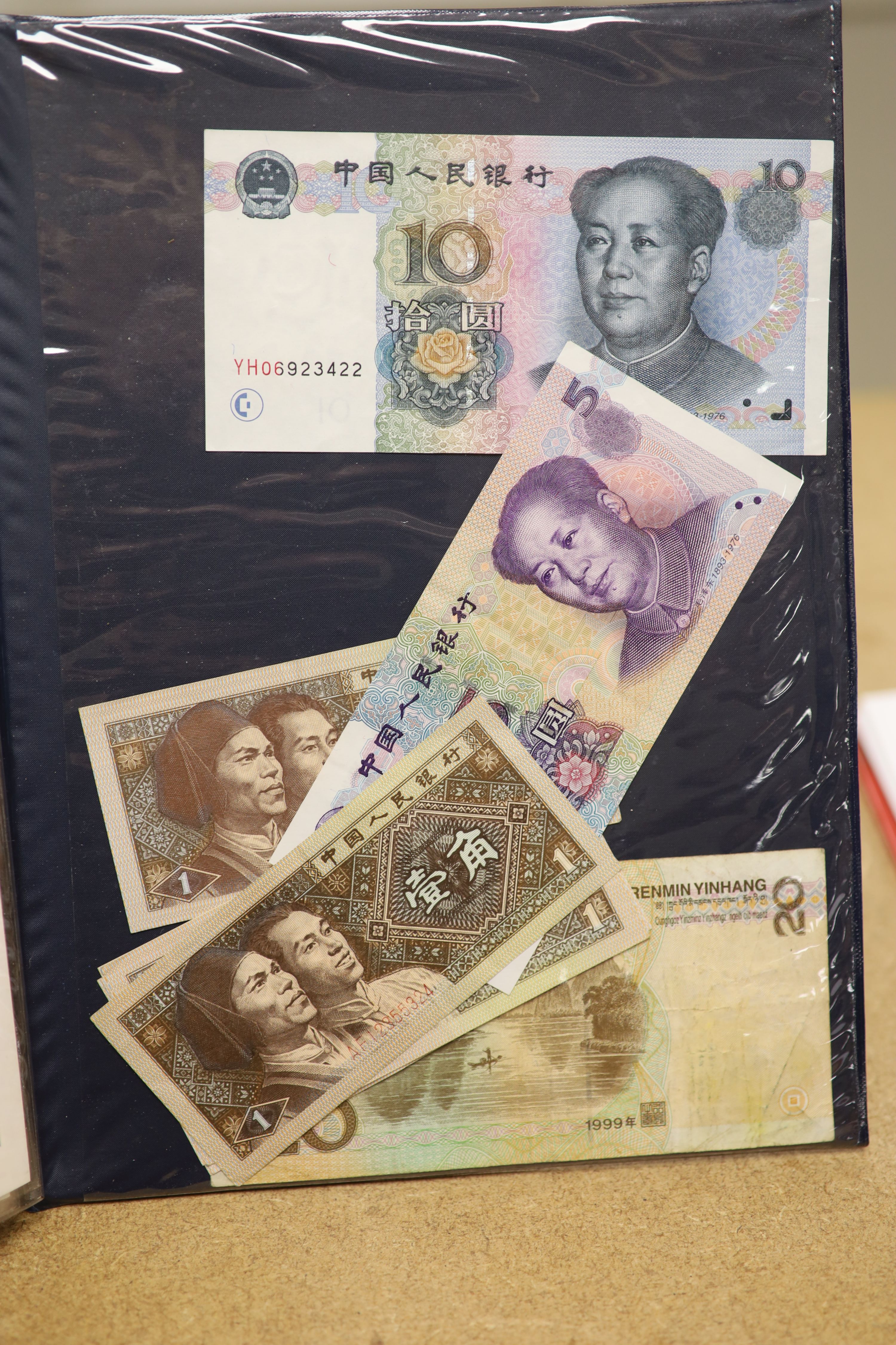 A collection of Chinese coins, cowrie shell currency and banknotes, Shang dynasty to PRC period
